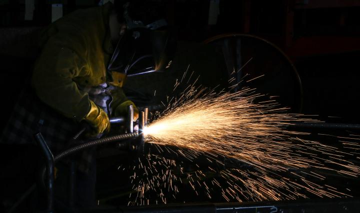 Welder wearing a mask